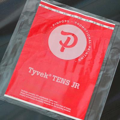 Punainen Tyvek Tens ranneke pysyvästi liimautuvalla tarrapinnalla